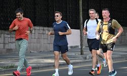 Macron'un yanındaki gizemli koşucunun sırrı çözüldü